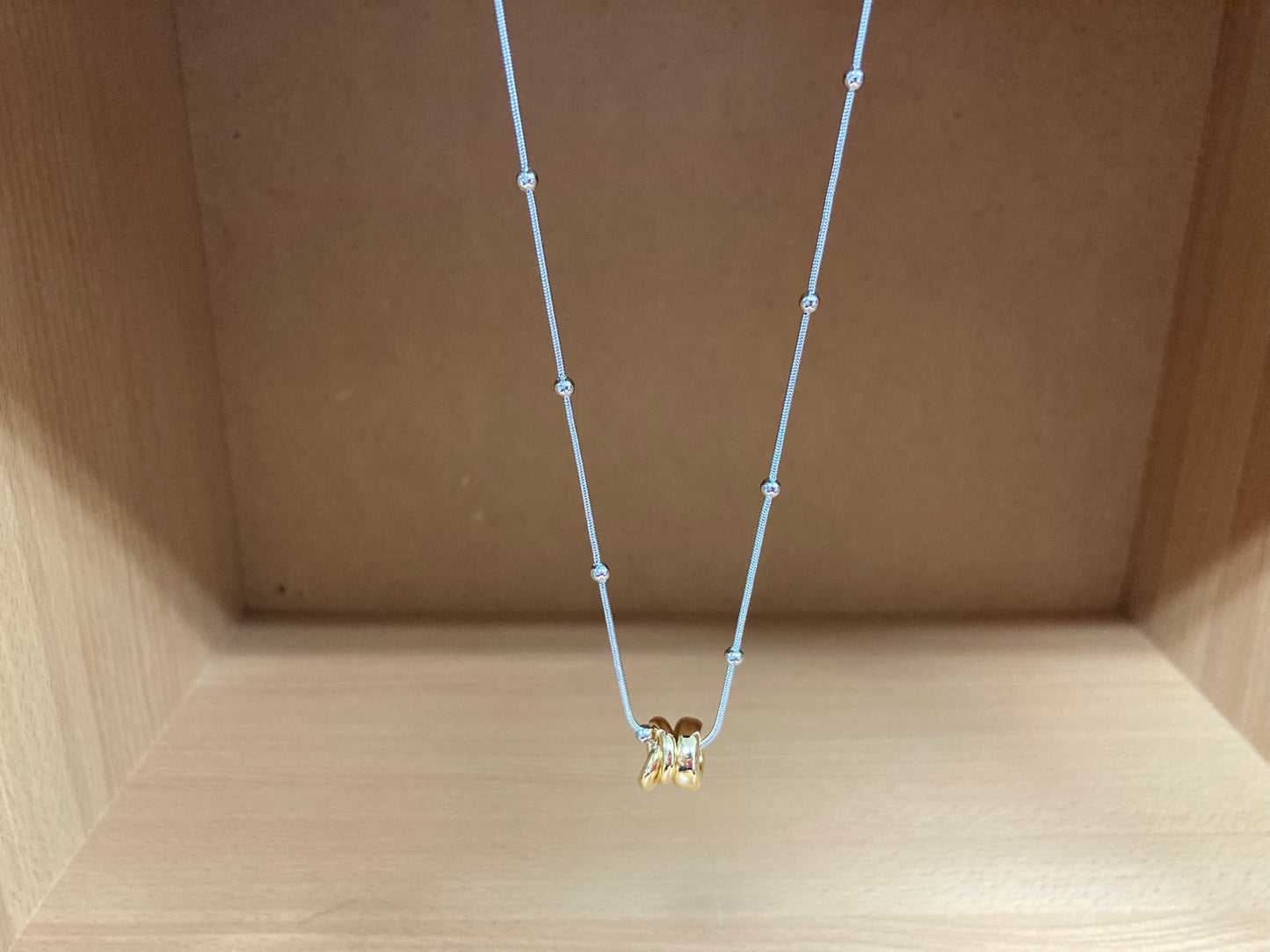 Tiny Treasures Seoul - Silver Chain Triple Gold Ring Necklace Front View 5