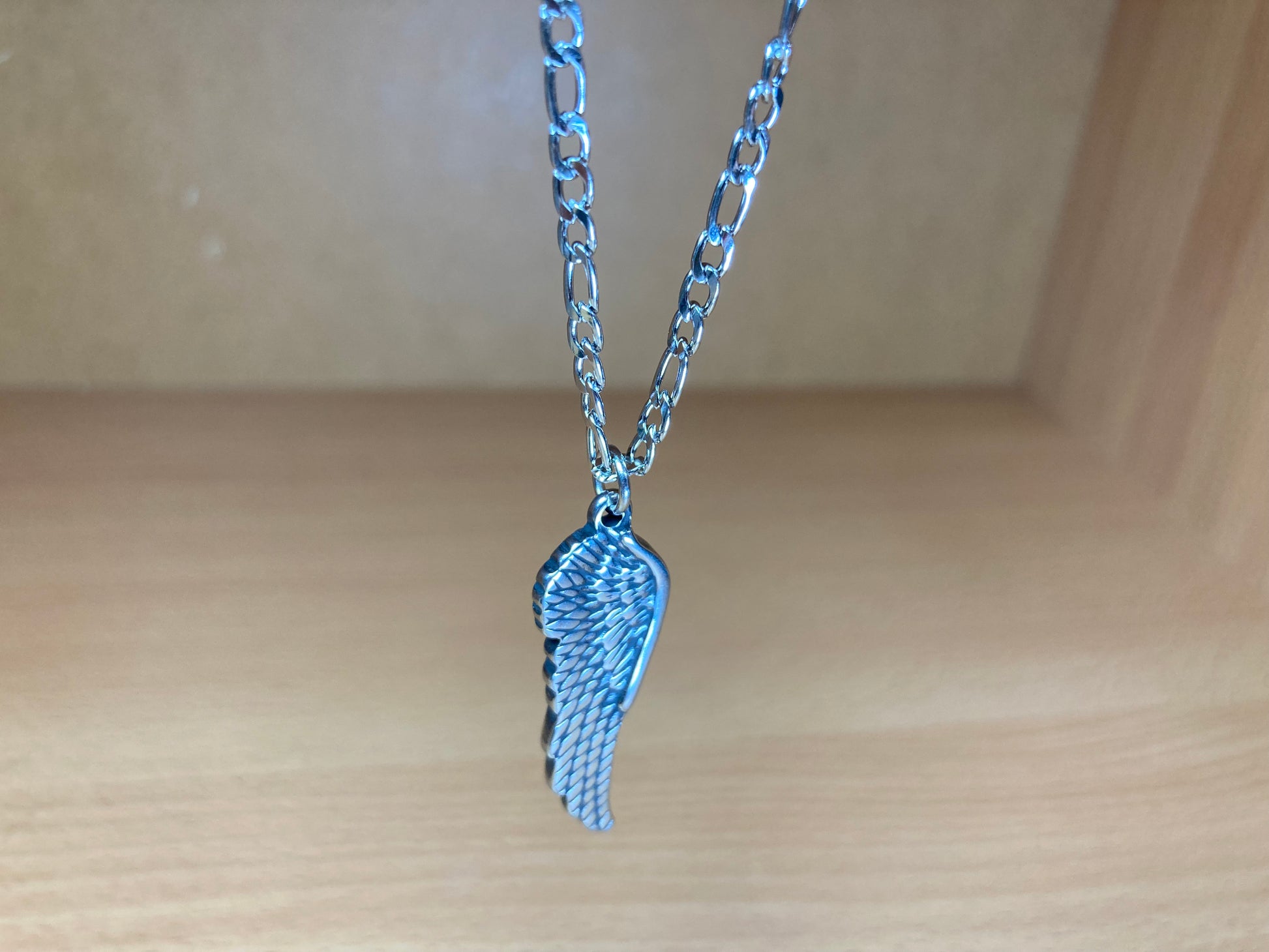 Tiny Treasures Seoul - Angel Wing Pendant Figaro Chain Necklace (Surgical Steel) Close up View