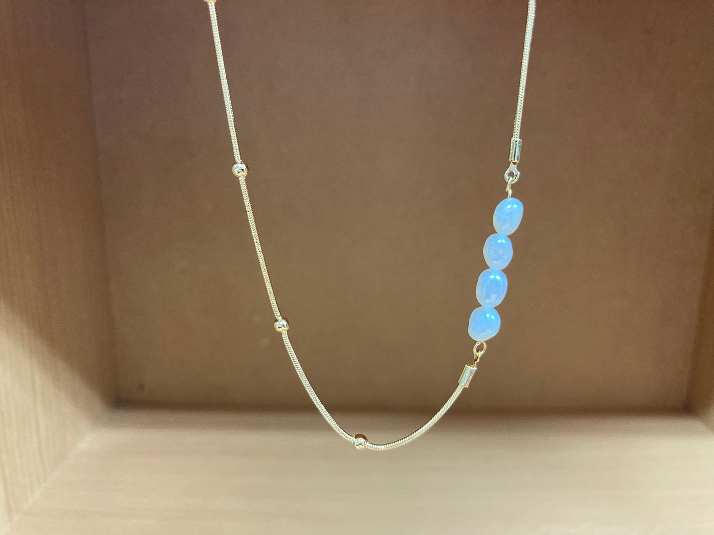 Tiny Treasures Seoul - Asymmetric Faux Pearl Gold Chain Necklace Front View 2