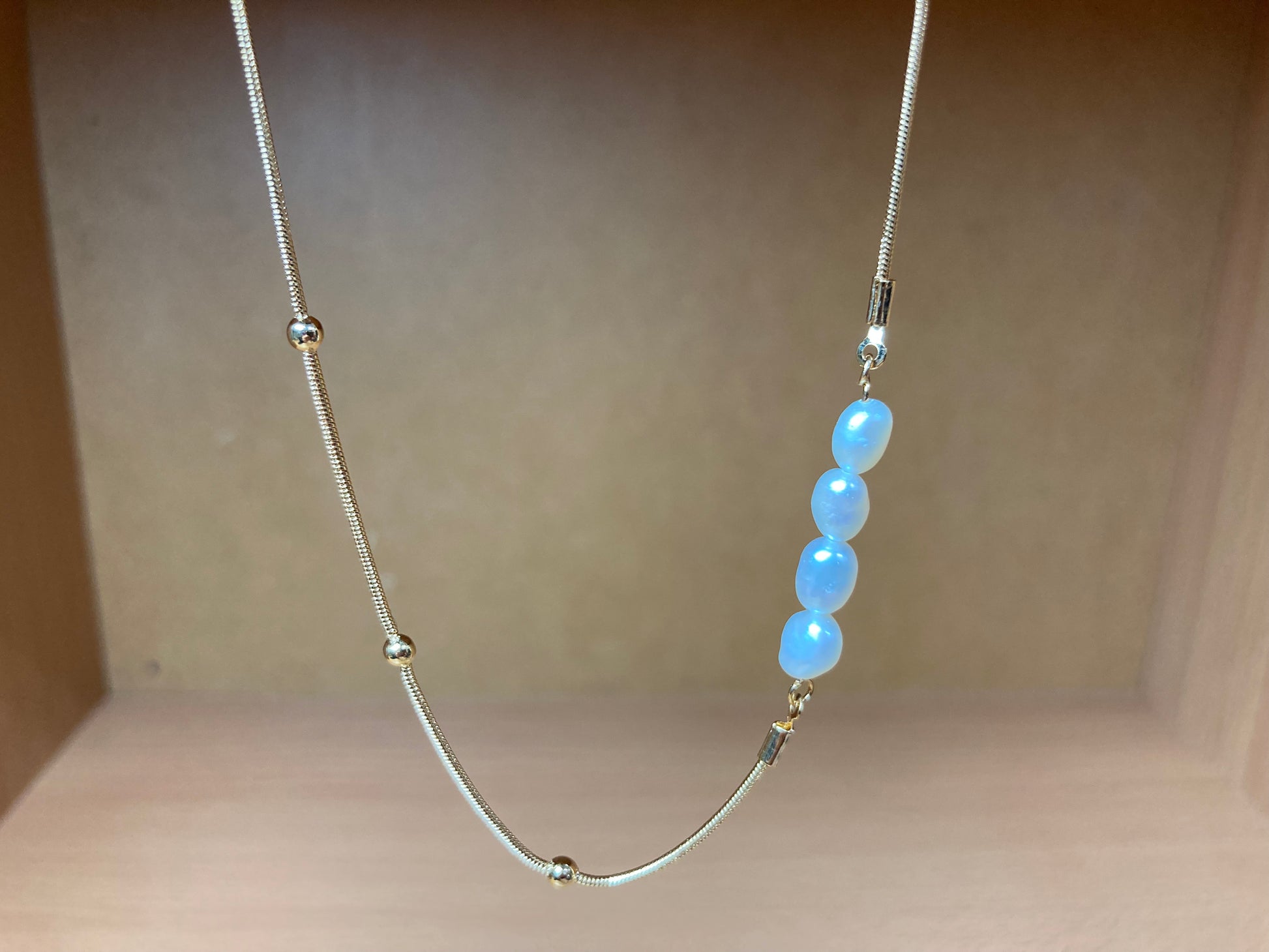 Tiny Treasures Seoul - Asymmetric Faux Pearl Gold Chain Necklace Close up View 6