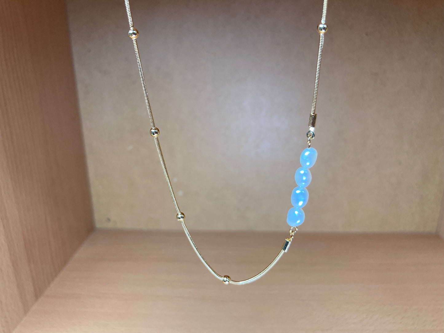 Tiny Treasures Seoul - Asymmetric Faux Pearl Gold Chain Necklace Close up View 3