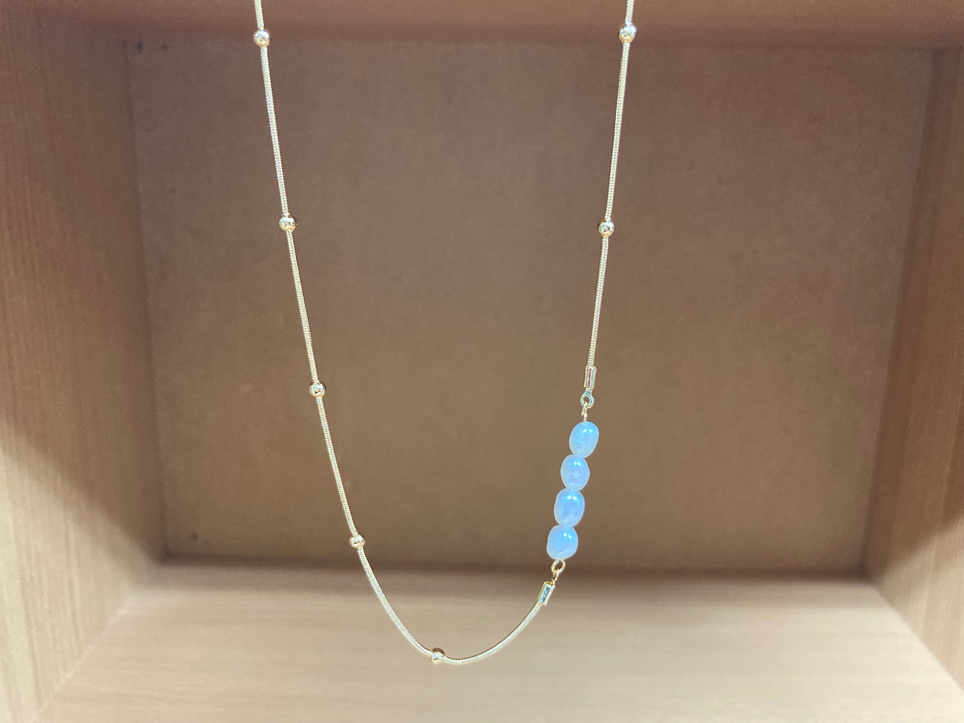 Tiny Treasures Seoul - Asymmetric Faux Pearl Gold Chain Necklace Front View 3
