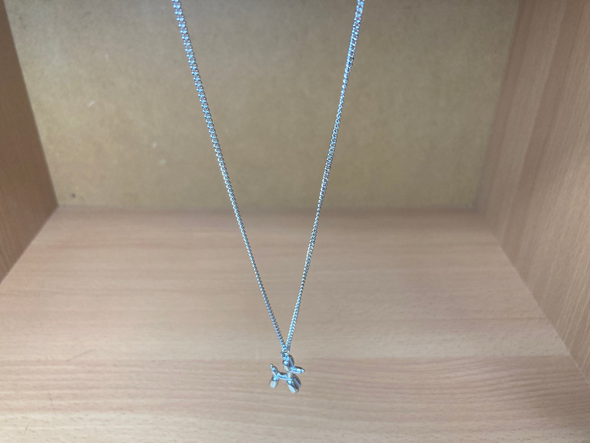 Tiny Treasures Seoul - Balloon Dog Surgical Steel Necklace Top View