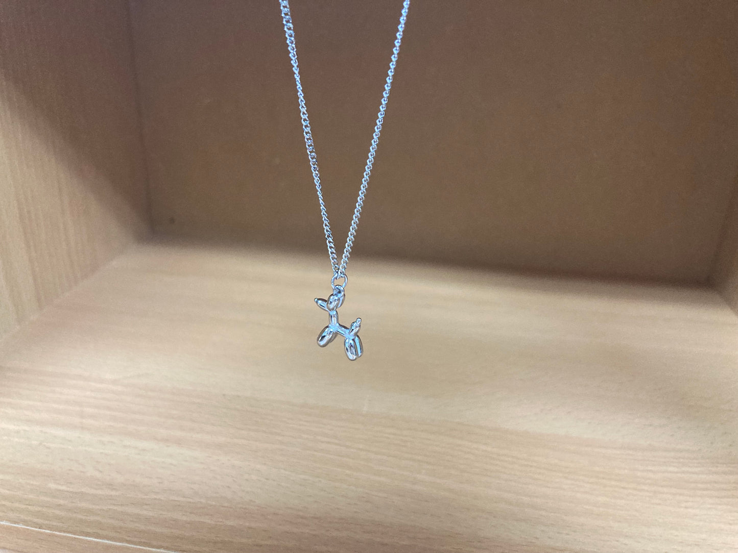 Tiny Treasures Seoul - Balloon Dog Surgical Steel Necklace Side View