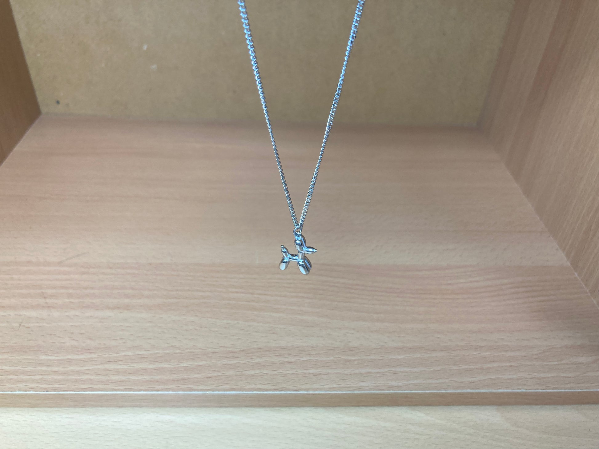 Tiny Treasures Seoul - Balloon Dog Surgical Steel Necklace Top View