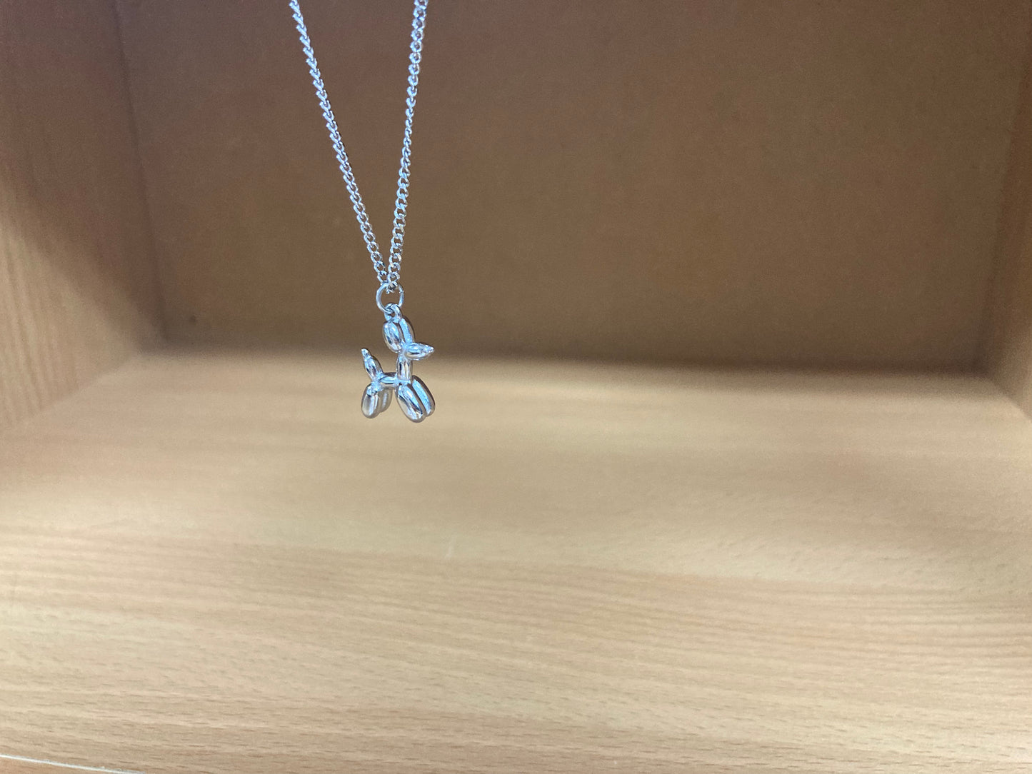Tiny Treasures Seoul - Balloon Dog Surgical Steel Necklace Close up View
