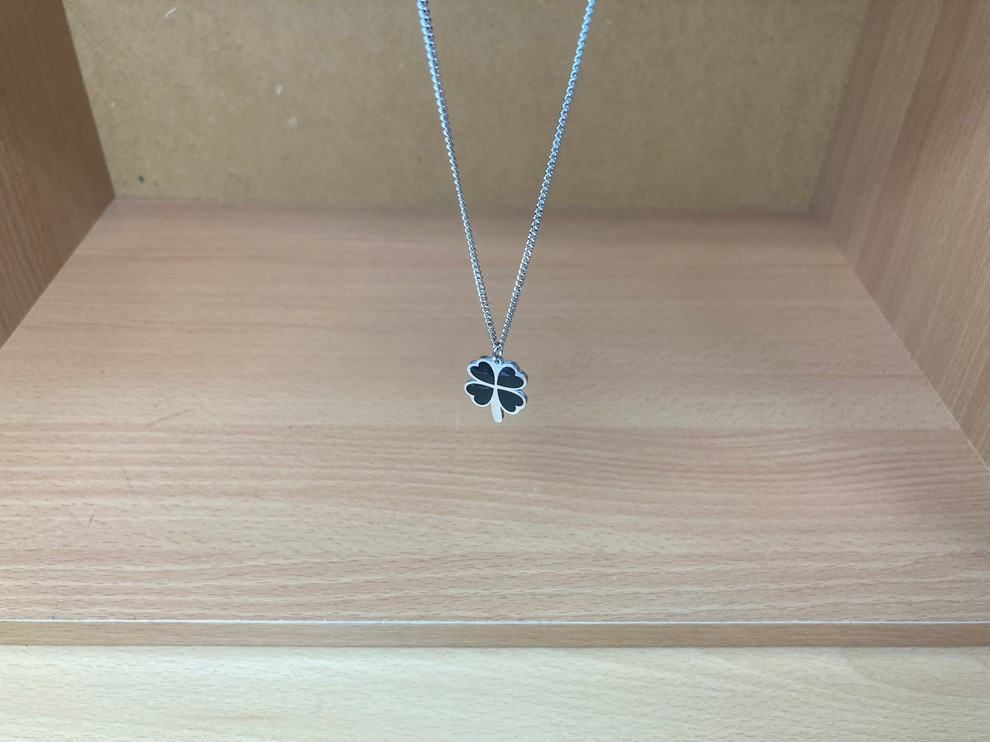 Tiny Treasures Seoul - Black Four-Leaf Clover Surgical Steel Necklace Top View