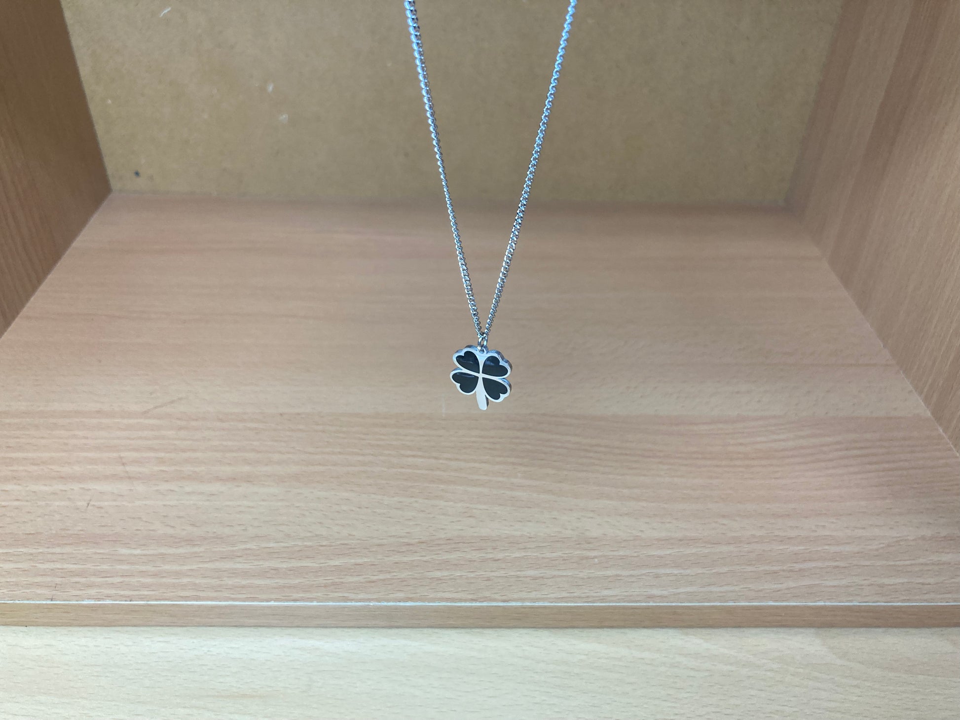 Tiny Treasures Seoul - Black Four-Leaf Clover Surgical Steel Necklace Top View