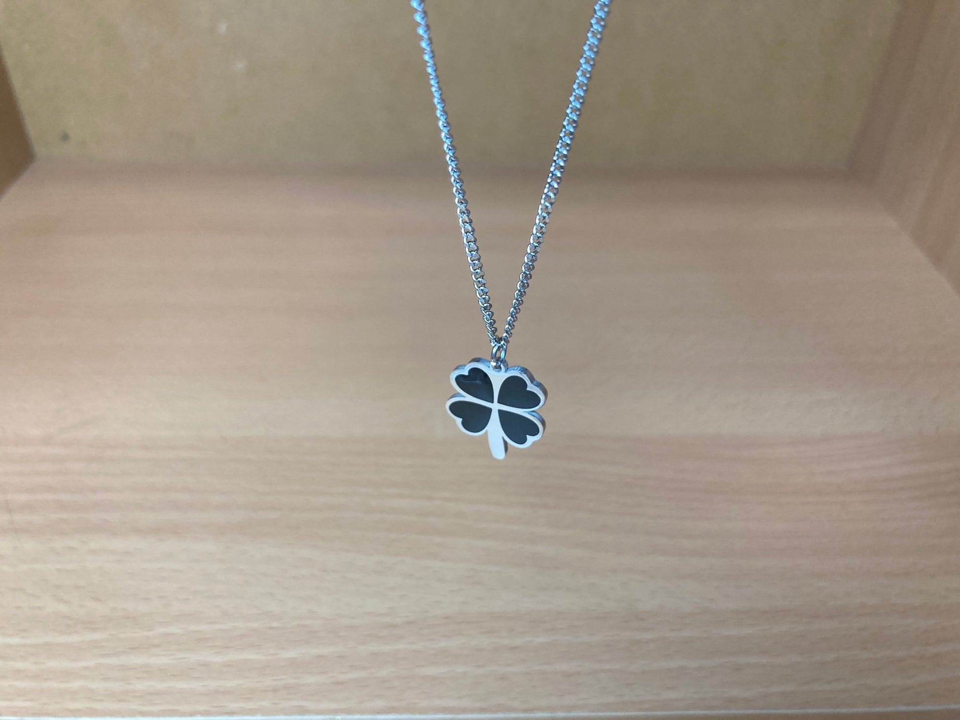 Tiny Treasures Seoul - Black Four-Leaf Clover Surgical Steel Necklace Close up View 3