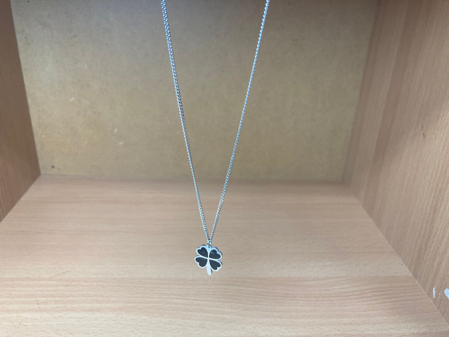 Tiny Treasures Seoul - Black Four-Leaf Clover Surgical Steel Necklace Top View 4