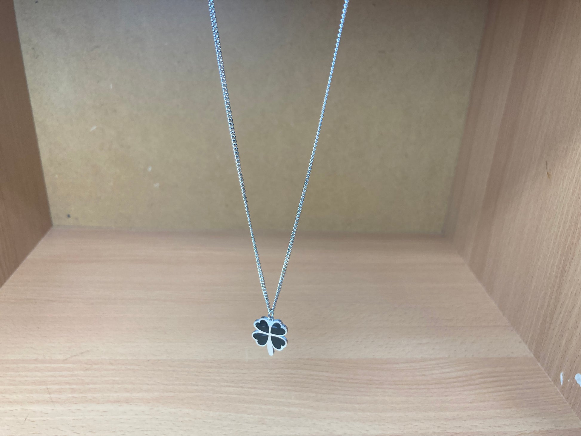 Tiny Treasures Seoul - Black Four-Leaf Clover Surgical Steel Necklace Top View 4