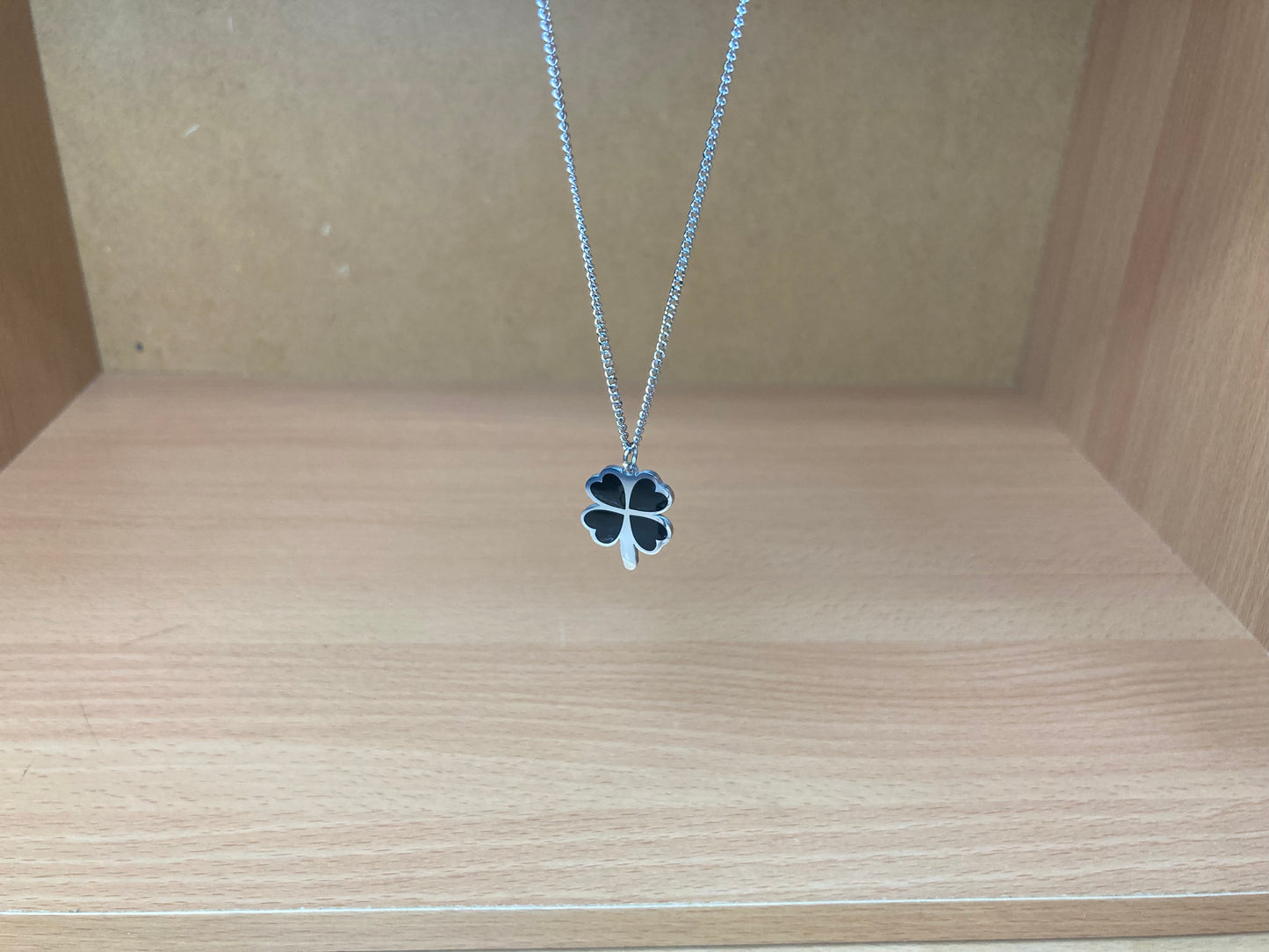 Tiny Treasures Seoul - Black Four-Leaf Clover Surgical Steel Necklace Front View 2