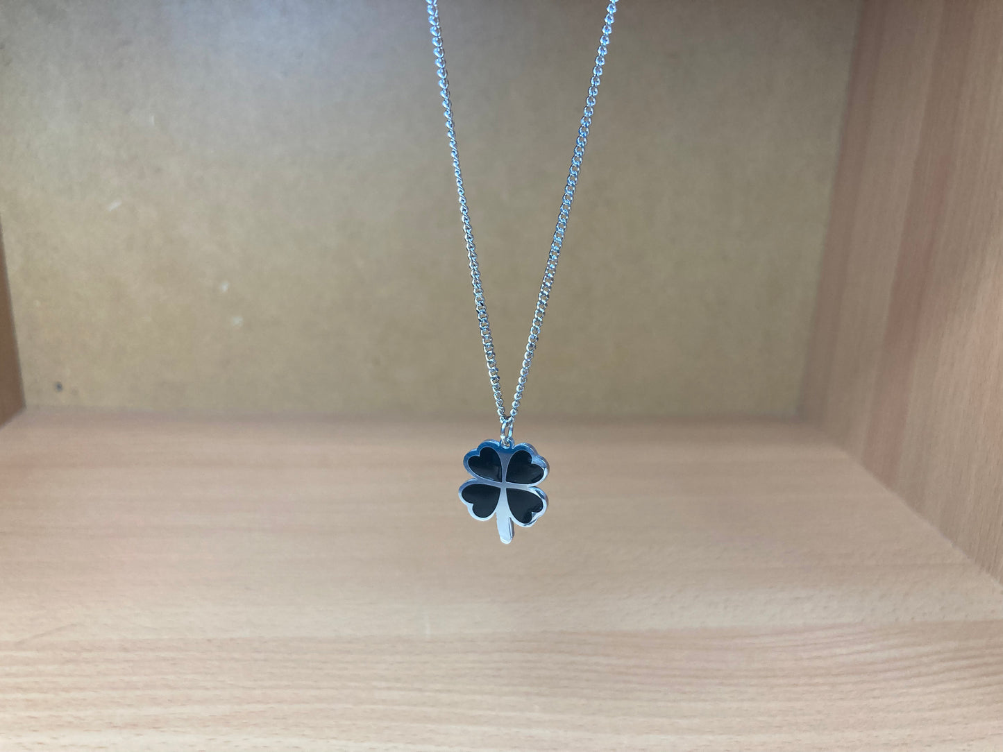 Tiny Treasures Seoul - Black Four-Leaf Clover Surgical Steel Necklace Front View 3