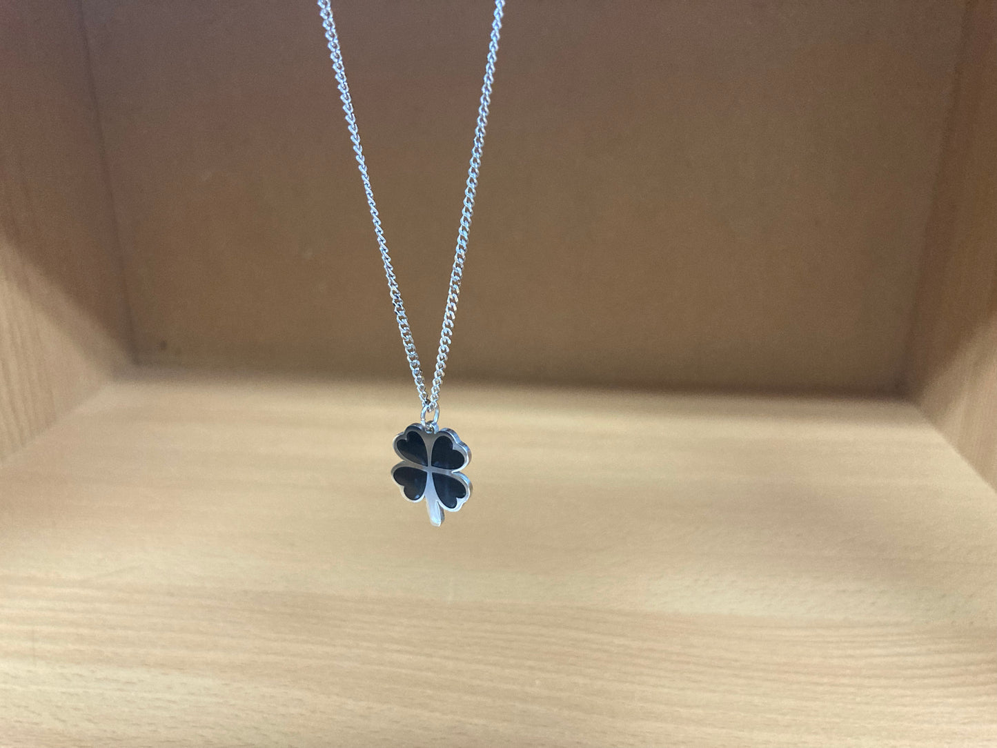 Tiny Treasures Seoul - Black Four-Leaf Clover Surgical Steel Necklace Front View 4