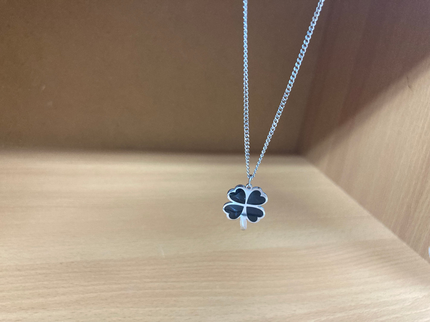 Tiny Treasures Seoul - Black Four-Leaf Clover Surgical Steel Necklace Front View 5