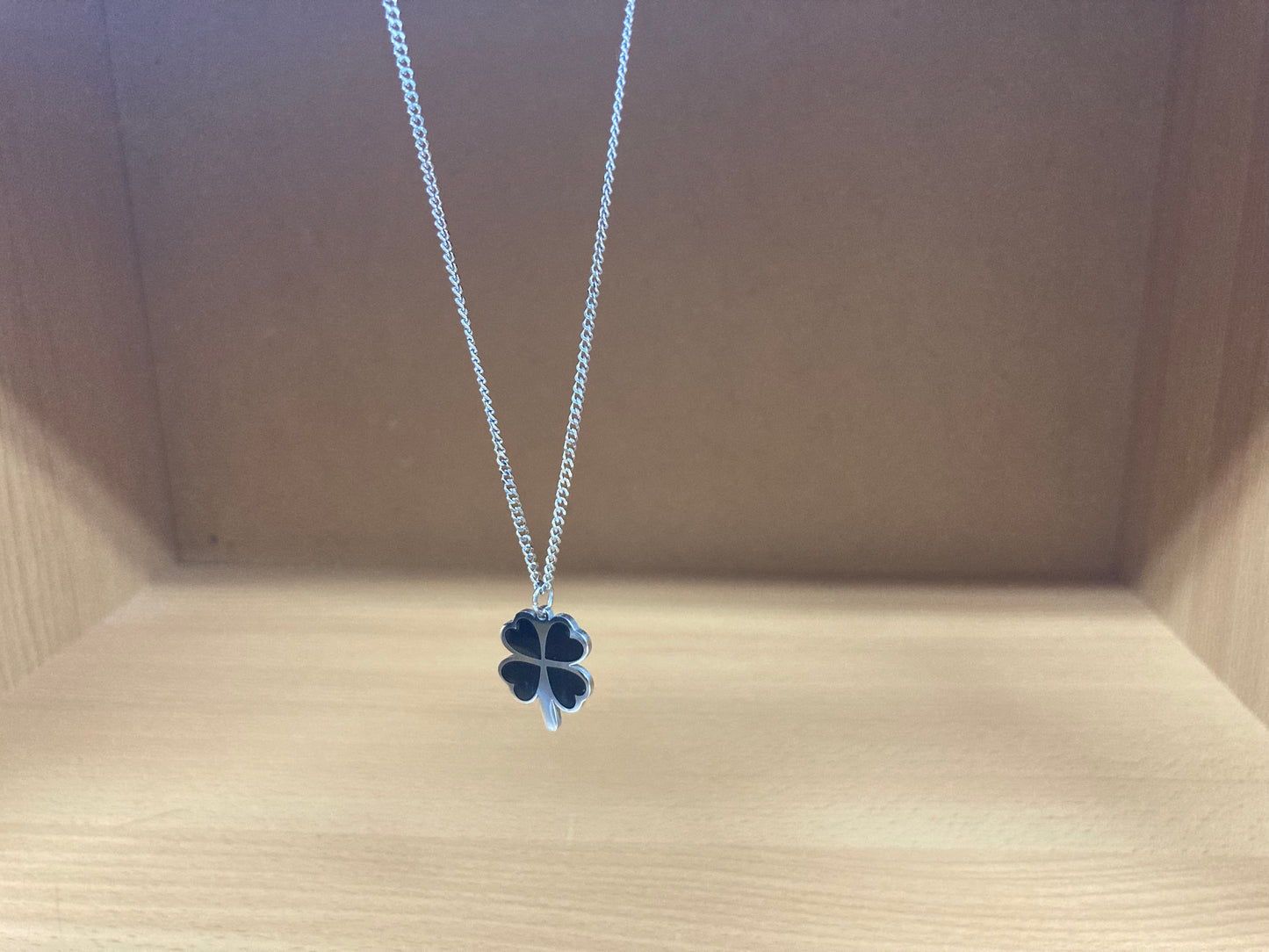 Tiny Treasures Seoul - Black Four-Leaf Clover Surgical Steel Necklace Side View