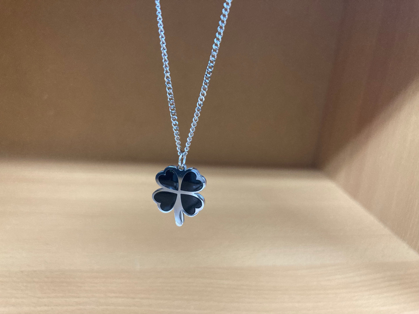 Tiny Treasures Seoul - Black Four-Leaf Clover Surgical Steel Necklace Close up View 2