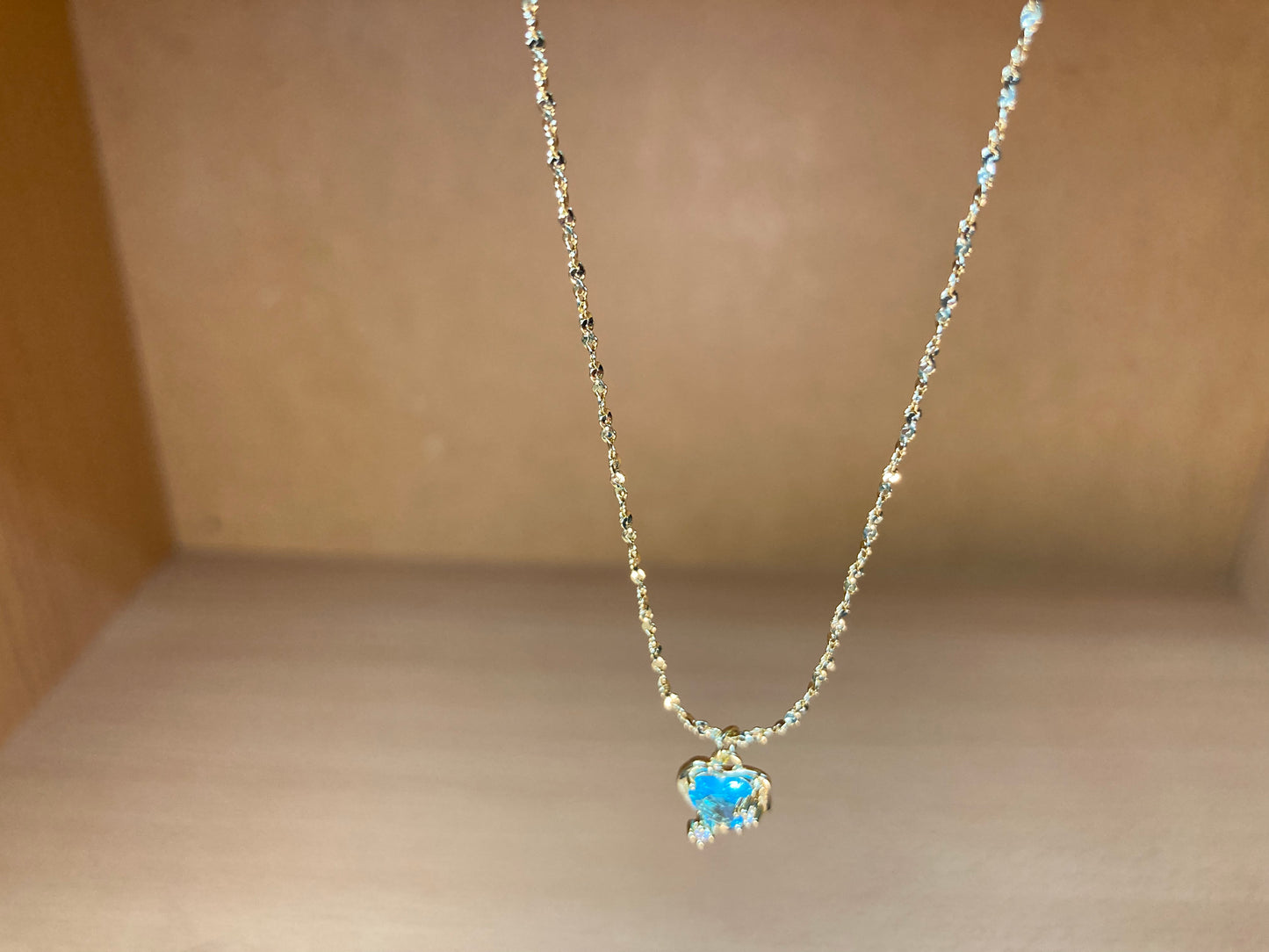 Tiny Treasures Seoul - Blue Cubic Zirconia Heart Necklace (Gold) Close up View