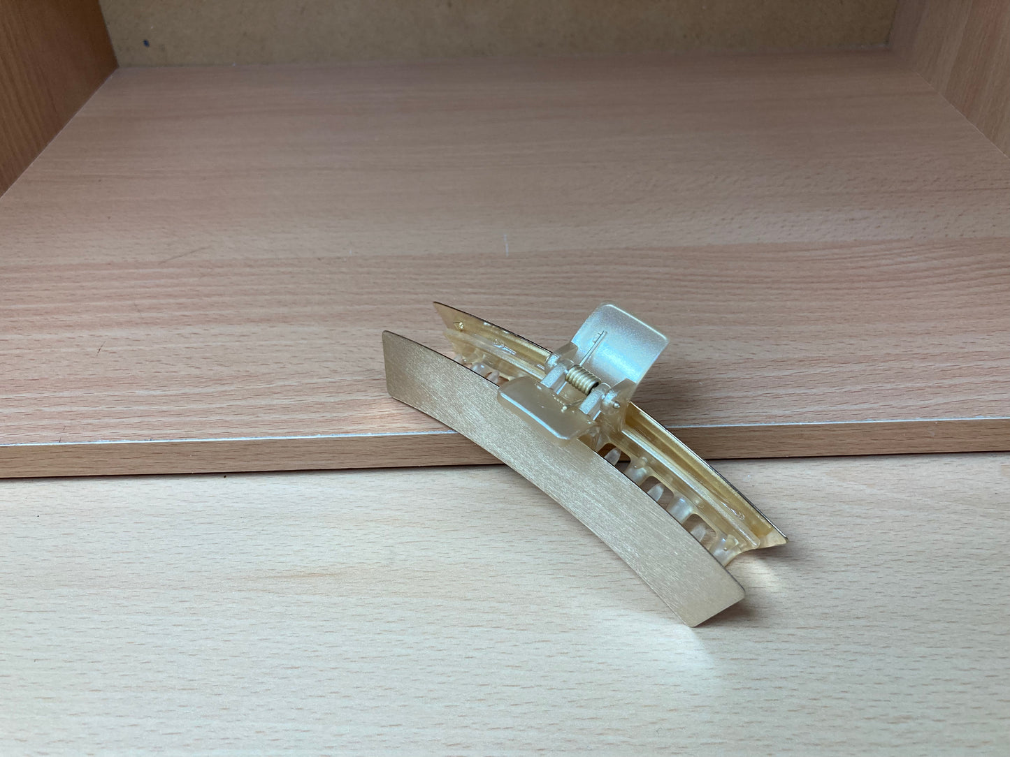 Tiny Treasures Seoul - Brushed Gold Curved Bar Hair Claw View