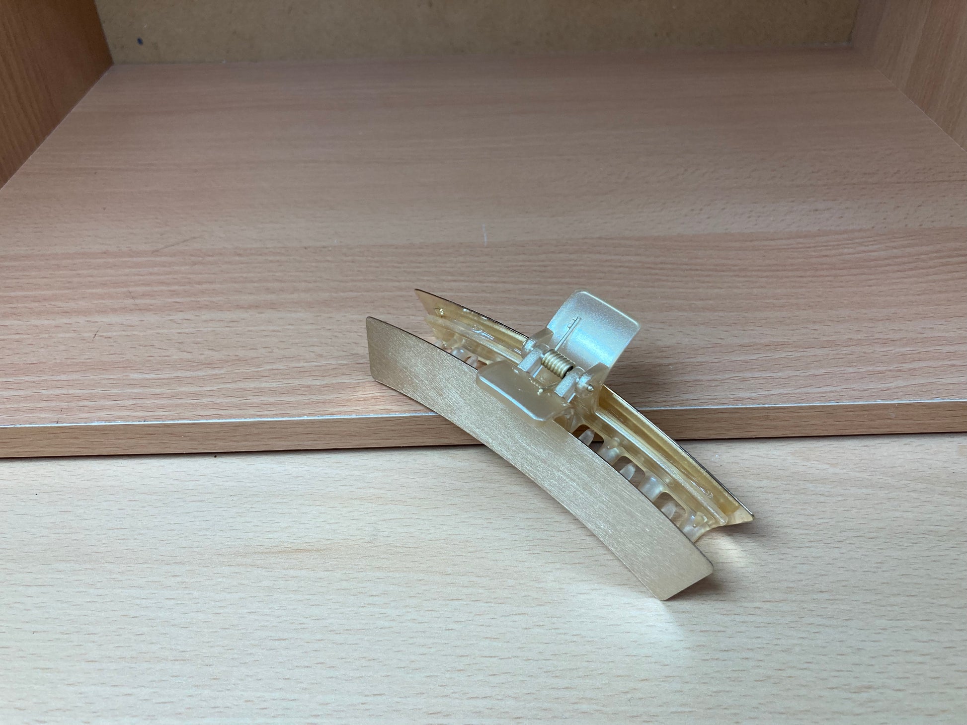 Tiny Treasures Seoul - Brushed Gold Curved Bar Hair Claw View