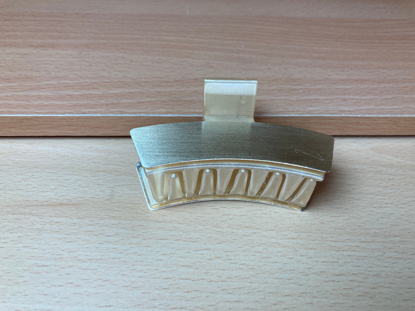 Tiny Treasures Seoul - Brushed Gold Mini Curved Bar Hair Claw Front View
