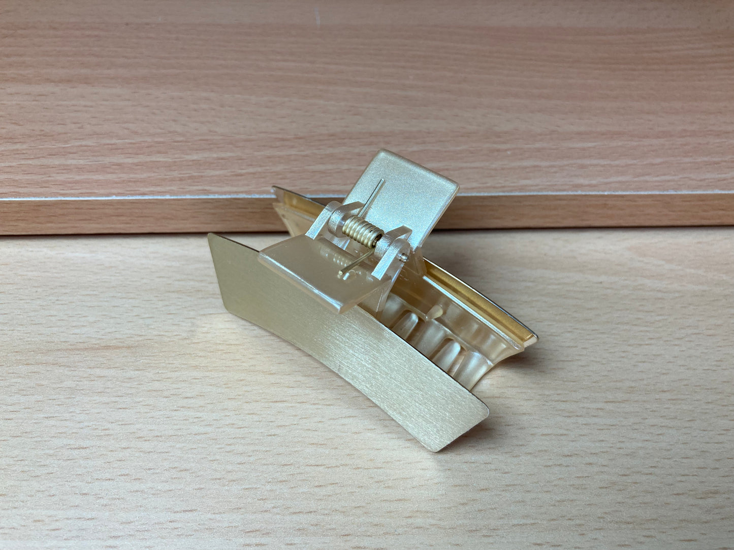 Tiny Treasures Seoul - Brushed Gold Mini Curved Bar Hair Claw Top View