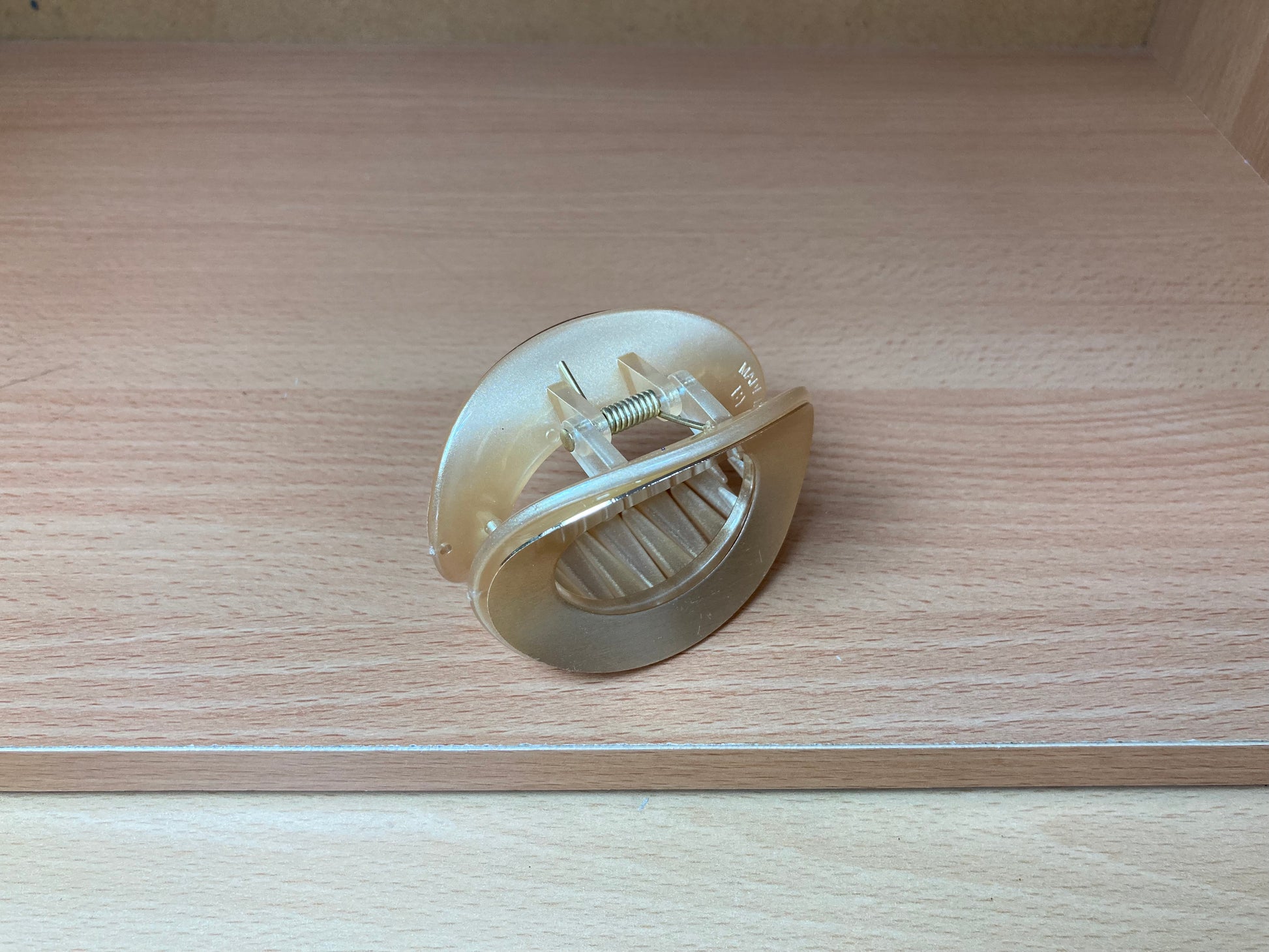 Tiny Treasures Seoul - Brushed Gold Open Oval Mini Hair Claw Top View 3