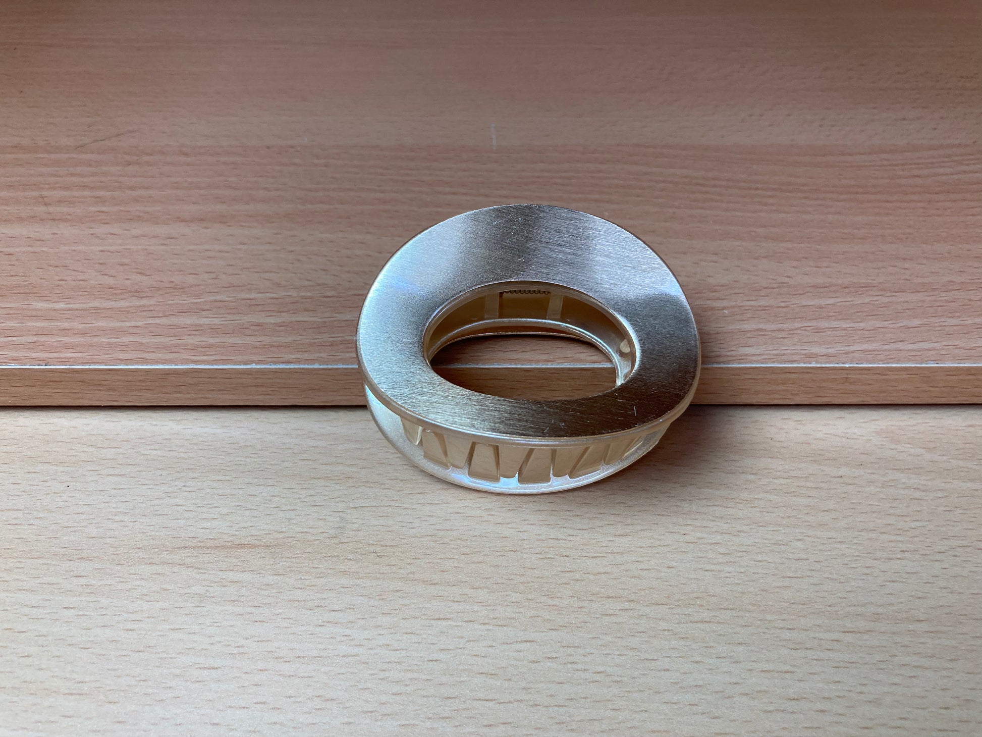 Tiny Treasures Seoul - Brushed Gold Open Oval Mini Hair Claw Close up View