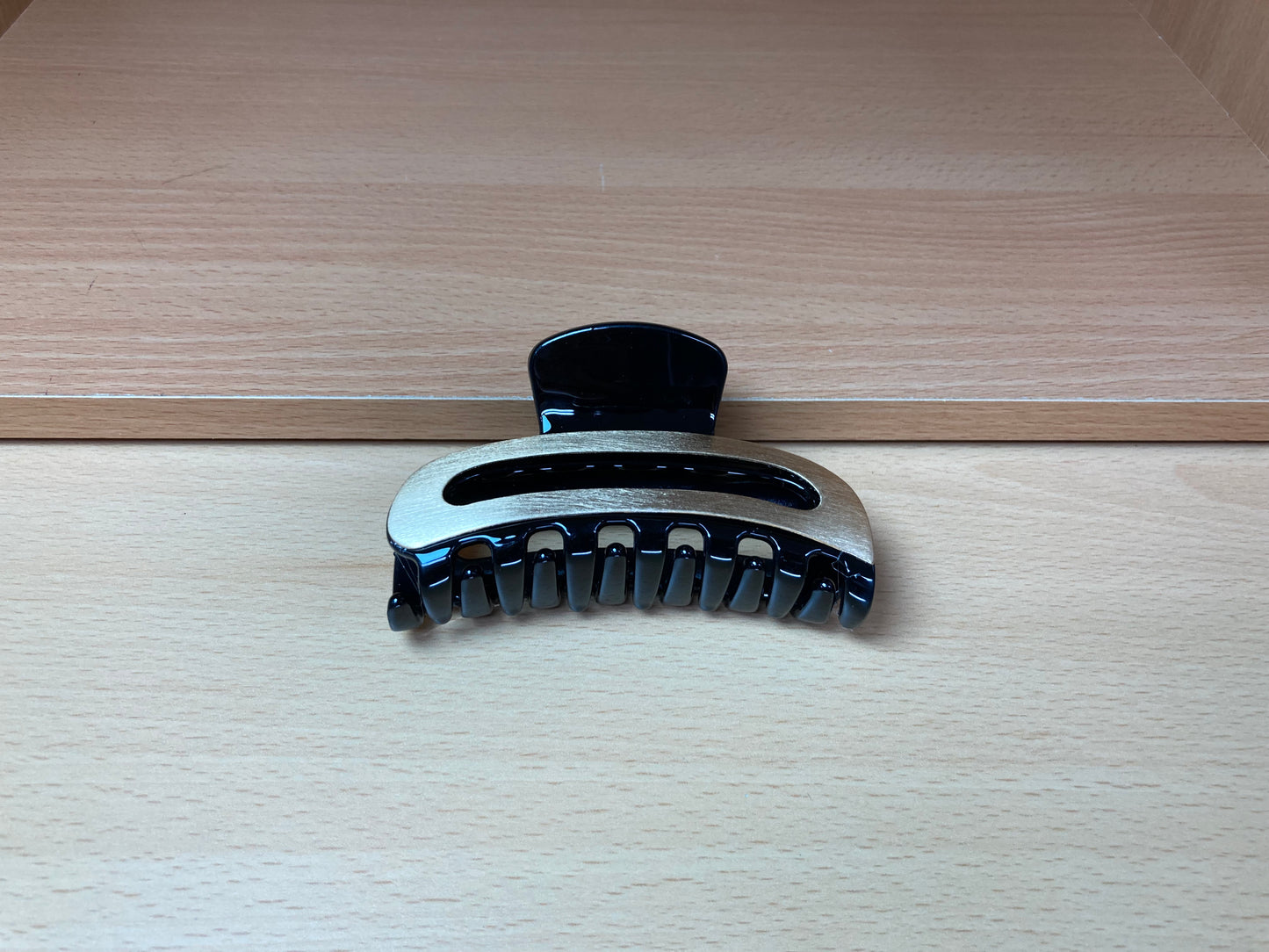 Tiny Treasures Seoul - Brushed Gold & Black Open Arc Hair Claw Side View