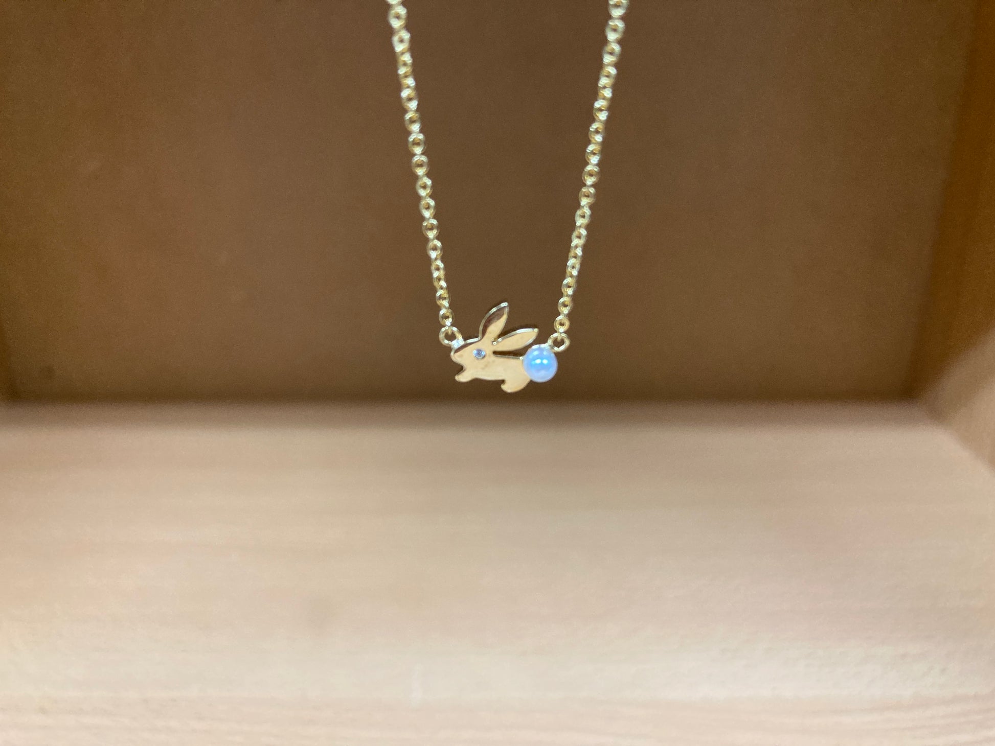 Tiny Treasures Seoul - Bunny Stone Eye & Pearl Tail Necklace (Gold) 10