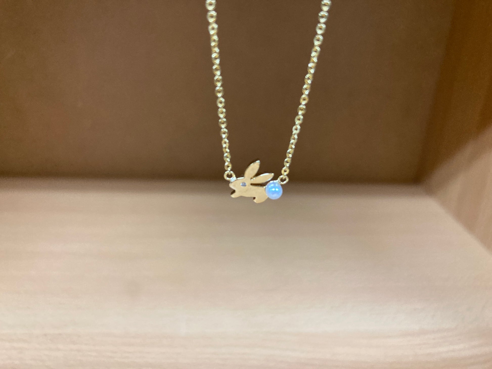 Tiny Treasures Seoul - Bunny Stone Eye & Pearl Tail Necklace (Gold) 4