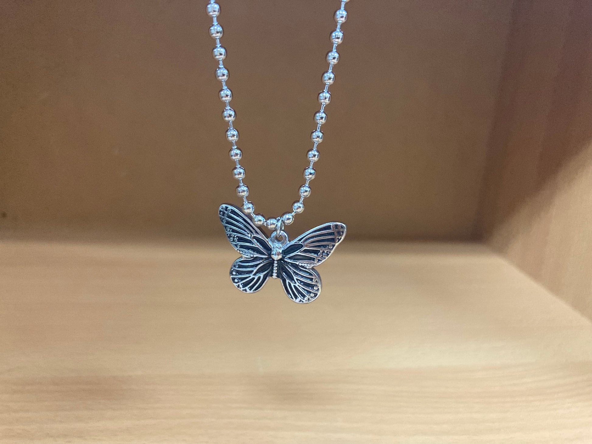 Tiny Treasures Seoul - Butterfly Pendant Ball Chain Necklace (Surgical Steel) Close up View