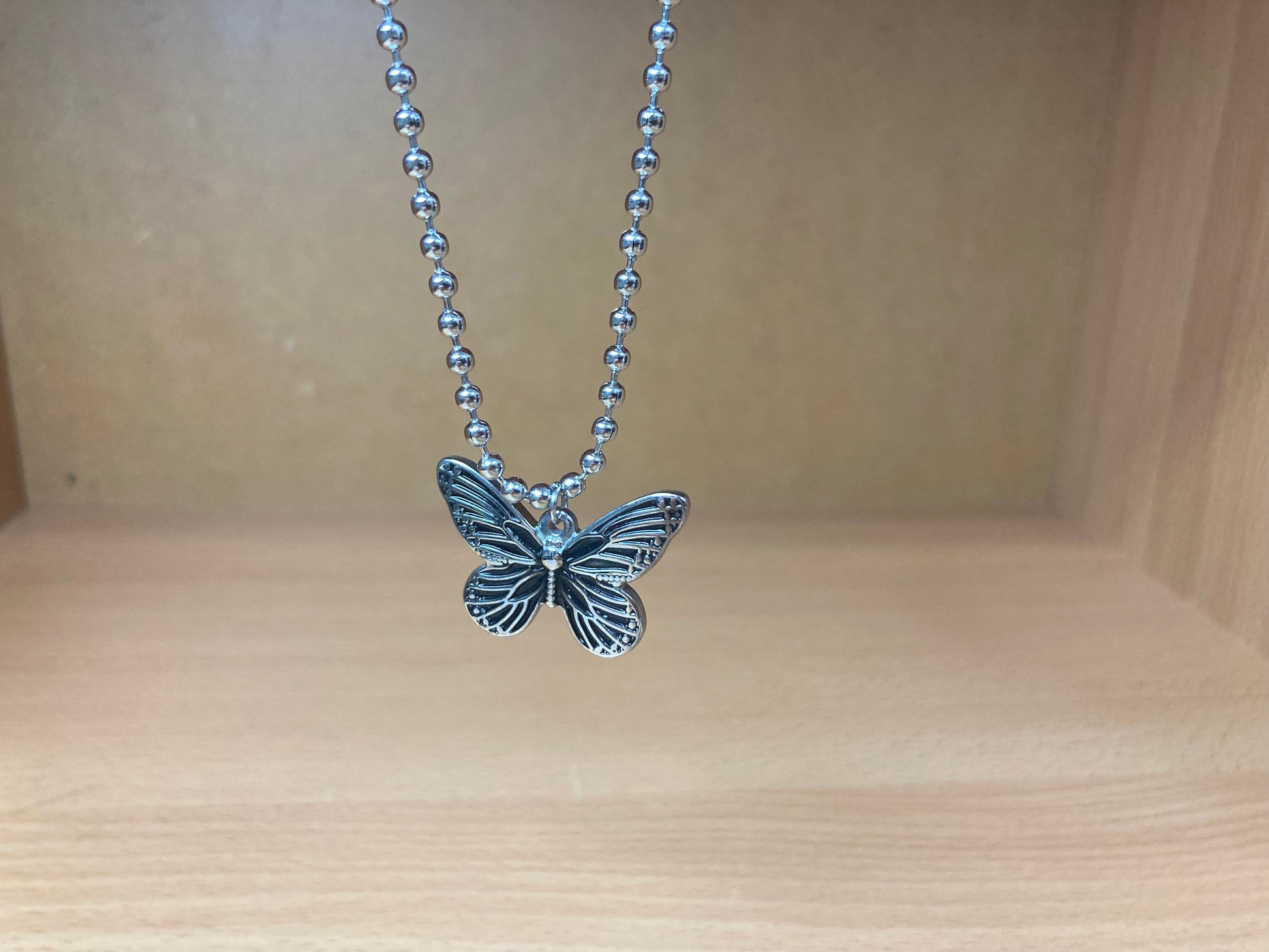 Tiny Treasures Seoul - Butterfly Pendant Ball Chain Necklace (Surgical Steel) Close up View 2