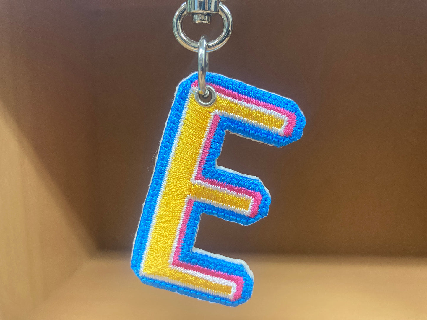 Tiny Treasures Seoul - Embroidered Initial E Bag Charm 9