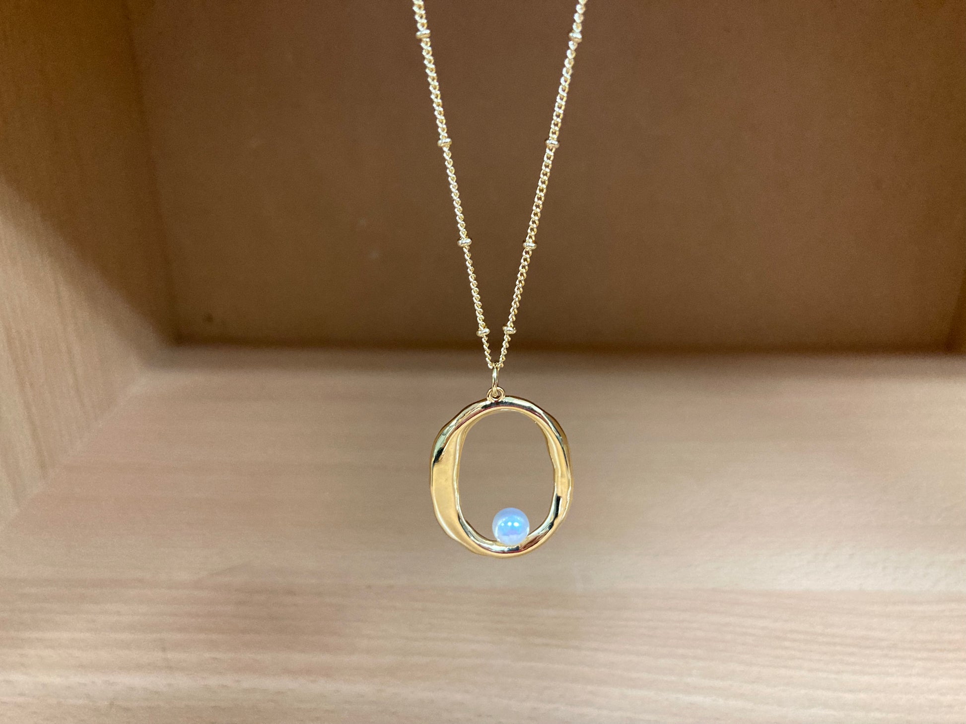Tiny Treasures Seoul - Gold Oval Pendant Pearl Chain Necklace Close up View 4