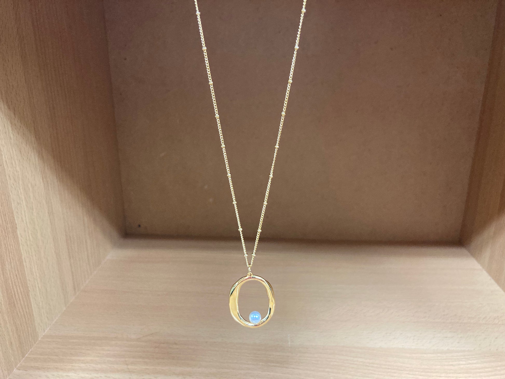 Tiny Treasures Seoul - Gold Oval Pendant Pearl Chain Necklace Front View 3