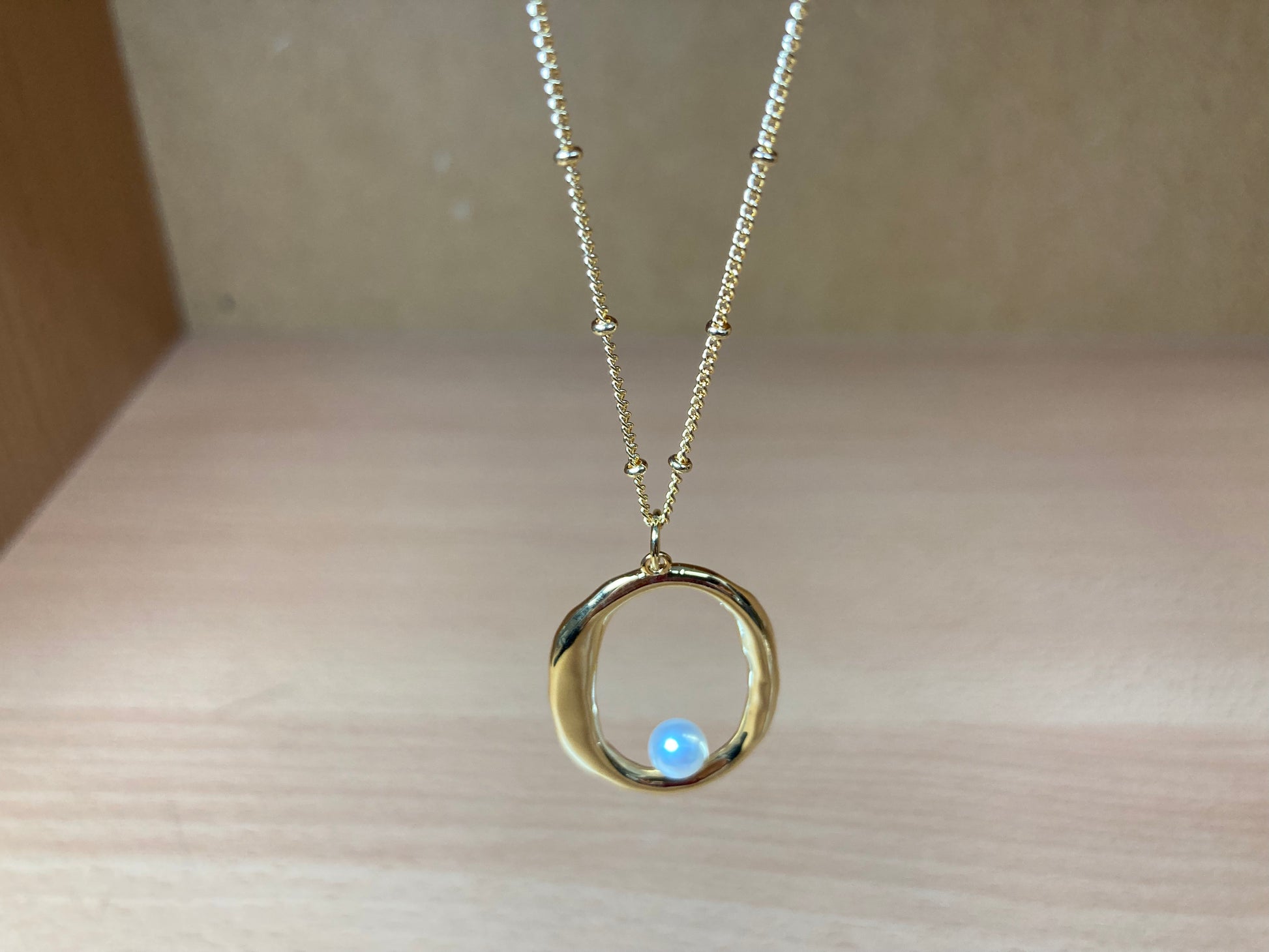 Tiny Treasures Seoul - Gold Oval Pendant Pearl Chain Necklace Close up View 6