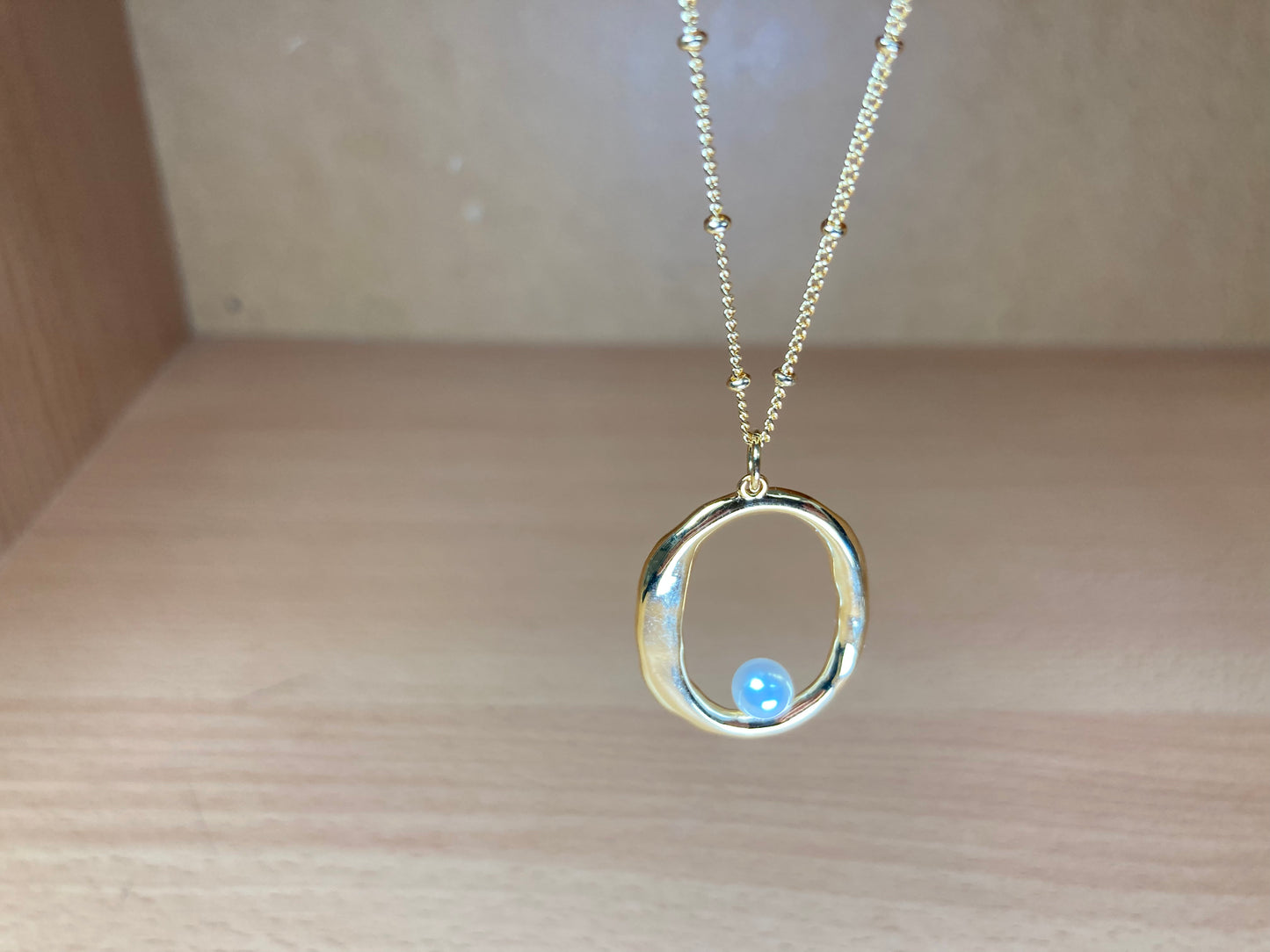 Tiny Treasures Seoul - Gold Oval Pendant Pearl Chain Necklace Close up View 2