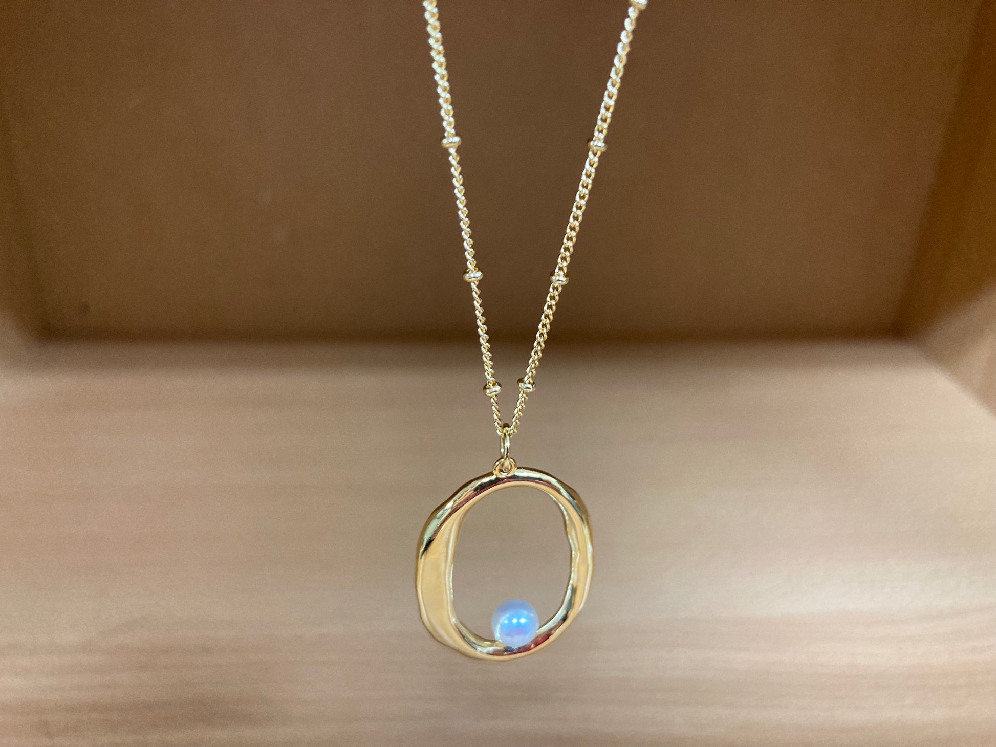 Tiny Treasures Seoul - Gold Oval Pendant Pearl Chain Necklace Close up View 8