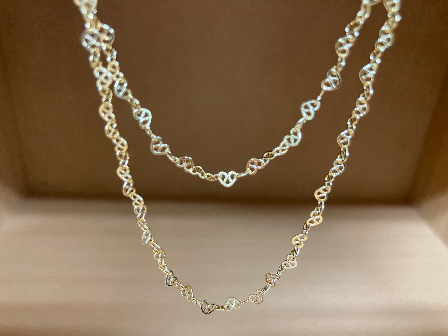 Tiny Treasures Seoul - Layered Heart Link Gold Necklace Close up View