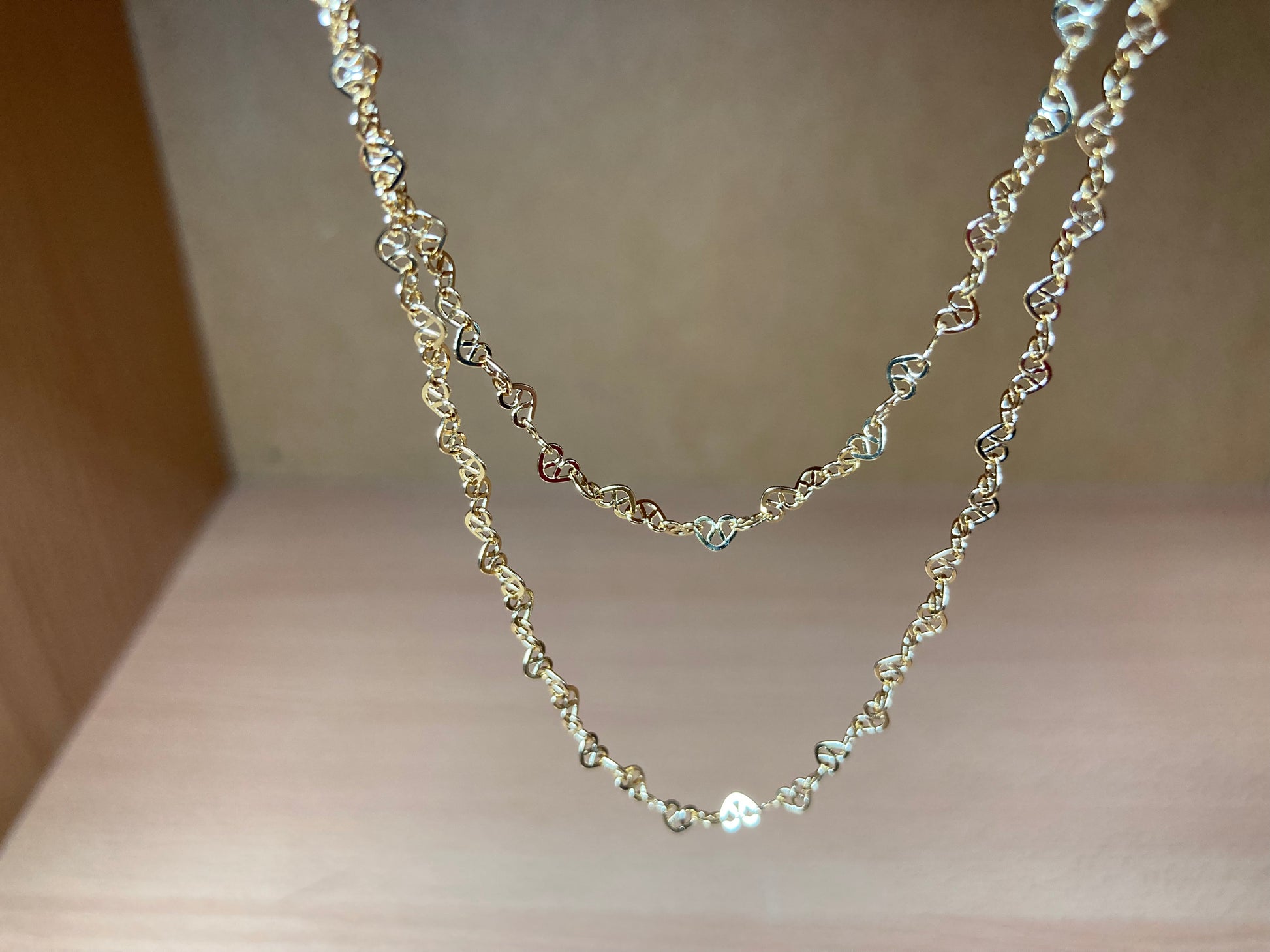Tiny Treasures Seoul - Layered Heart Link Gold Necklace Close up View 2