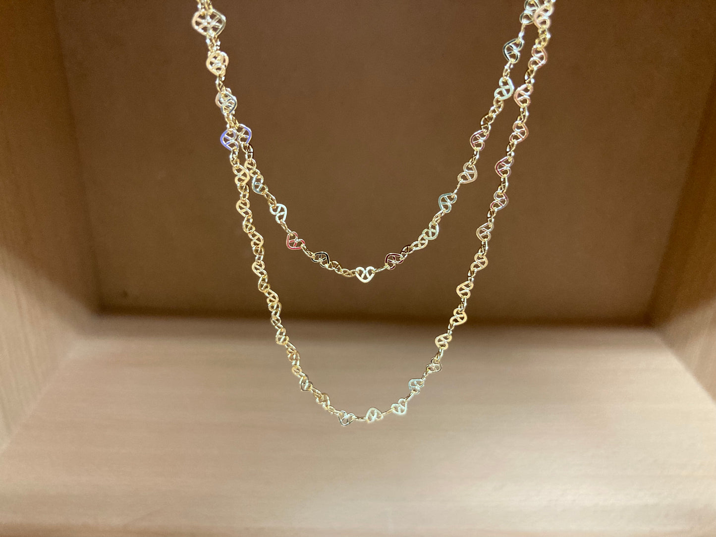 Tiny Treasures Seoul - Layered Heart Link Gold Necklace Close up View 5