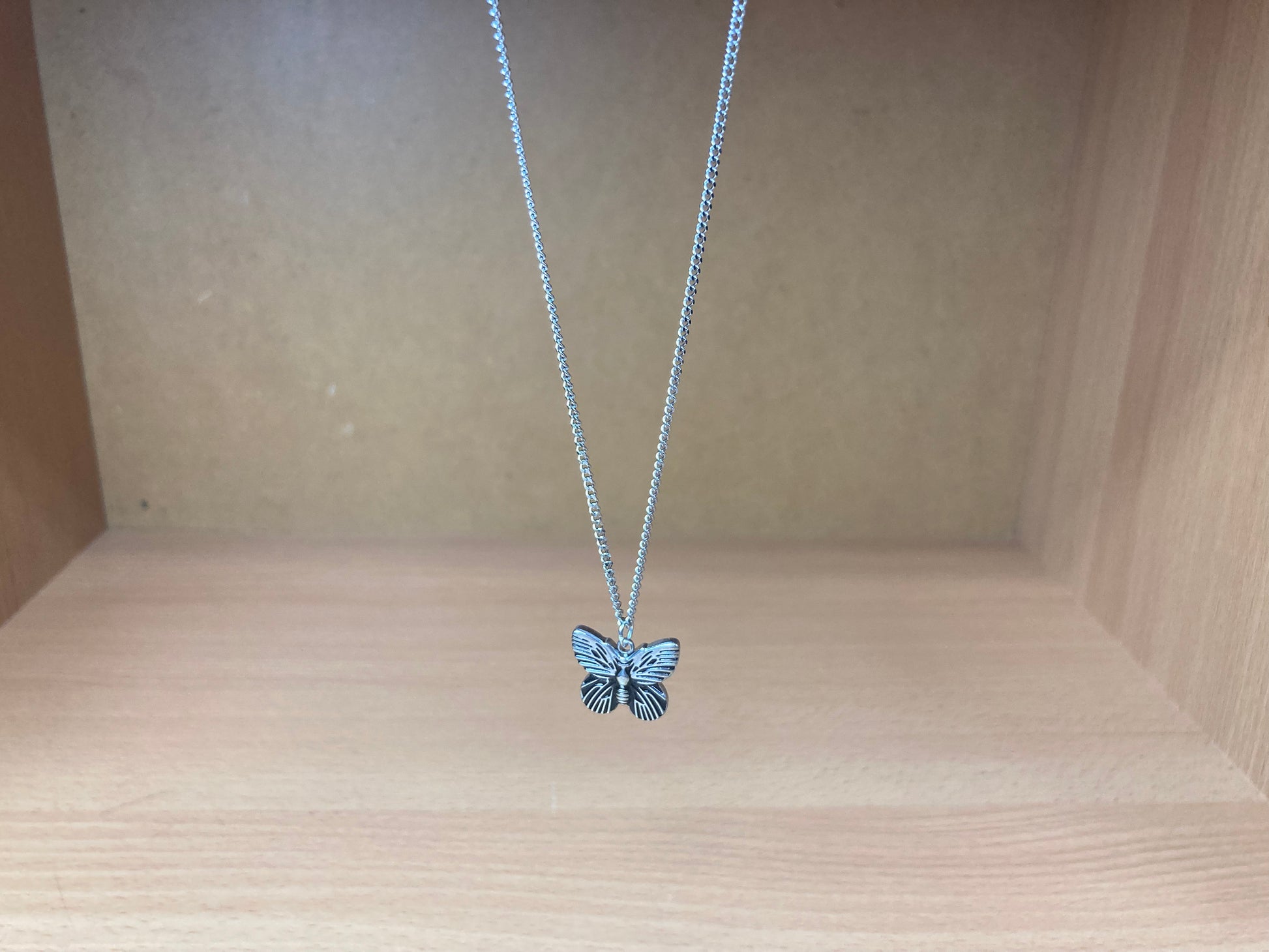 Tiny Treasures Seoul - Mini Butterfly Pendant Necklace (Surgical Steel) Top View