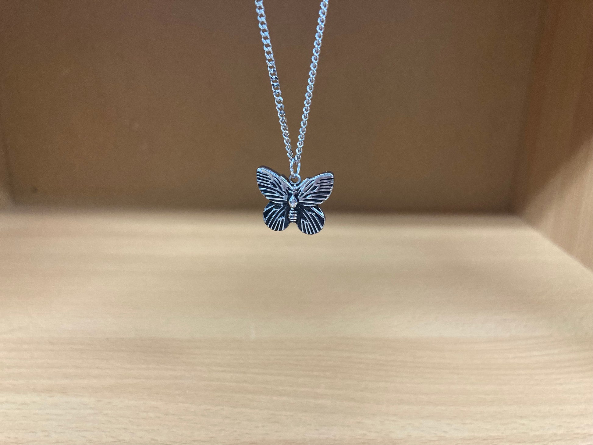 Tiny Treasures Seoul - Mini Butterfly Pendant Necklace (Surgical Steel) Close up View