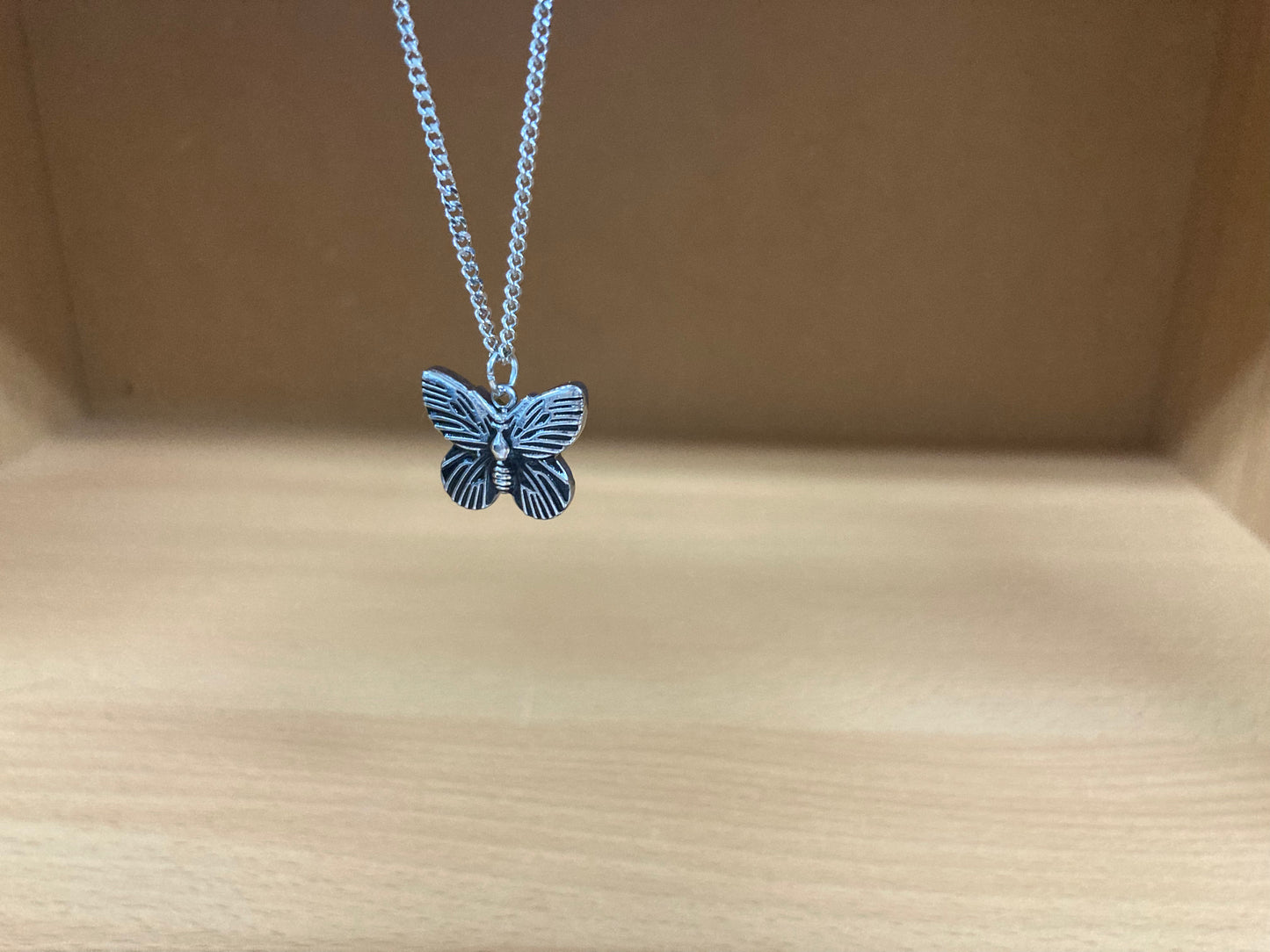 Tiny Treasures Seoul - Mini Butterfly Pendant Necklace (Surgical Steel) Close up View 3
