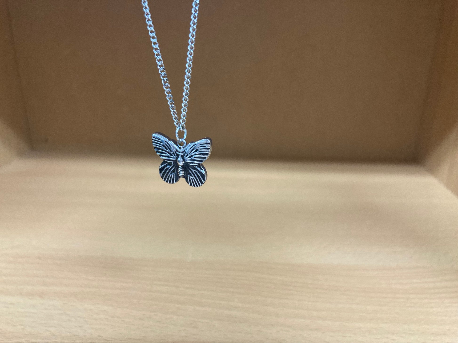 Tiny Treasures Seoul - Mini Butterfly Pendant Necklace (Surgical Steel) Close up View 3