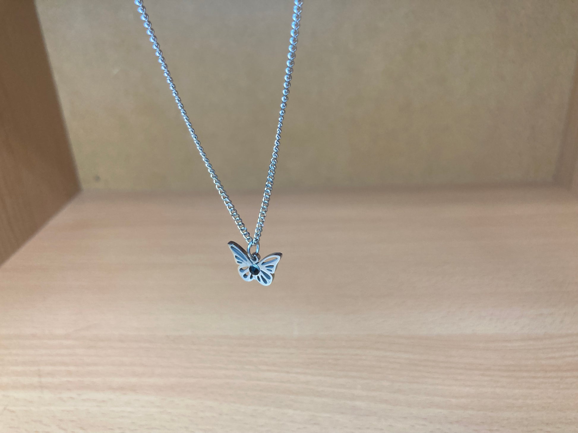 Tiny Treasures Seoul - Open Butterfly Surgical Steel Necklace Front View 5