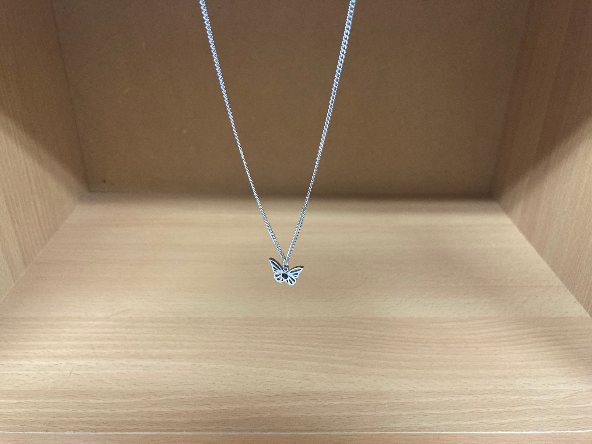 Tiny Treasures Seoul - Open Butterfly Surgical Steel Necklace Side View