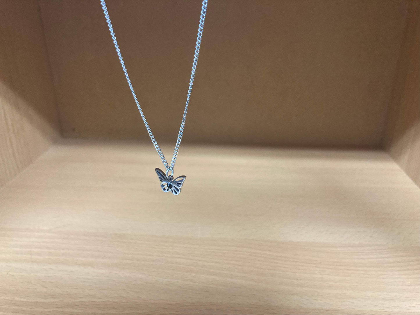 Tiny Treasures Seoul - Open Butterfly Surgical Steel Necklace Side View 2