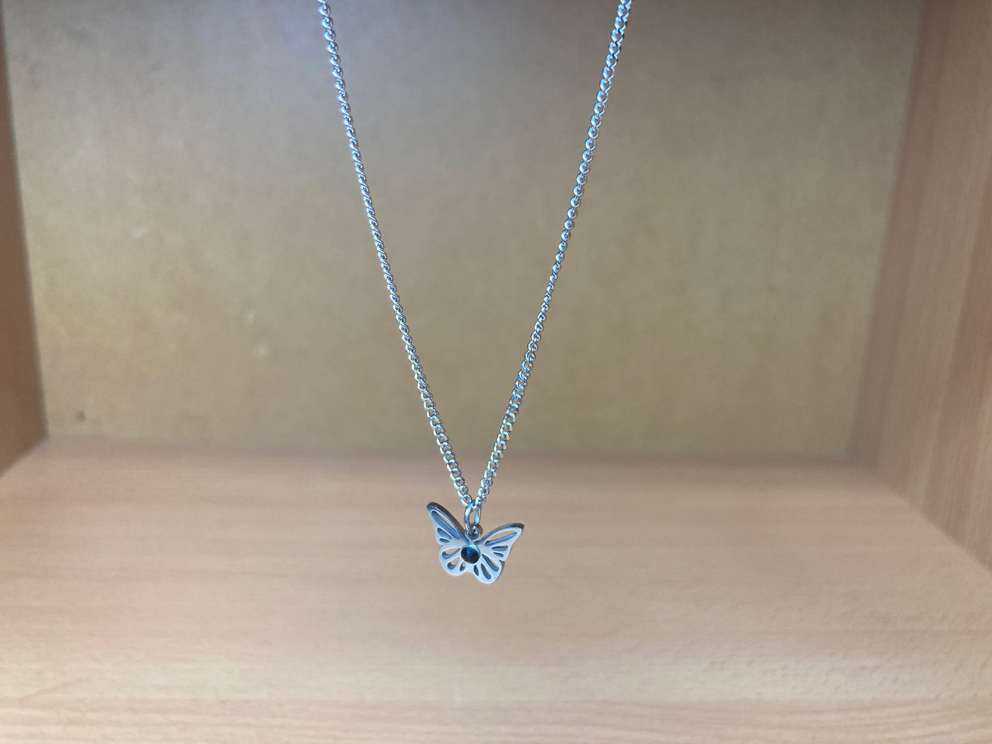 Tiny Treasures Seoul - Open Butterfly Surgical Steel Necklace Front View 2